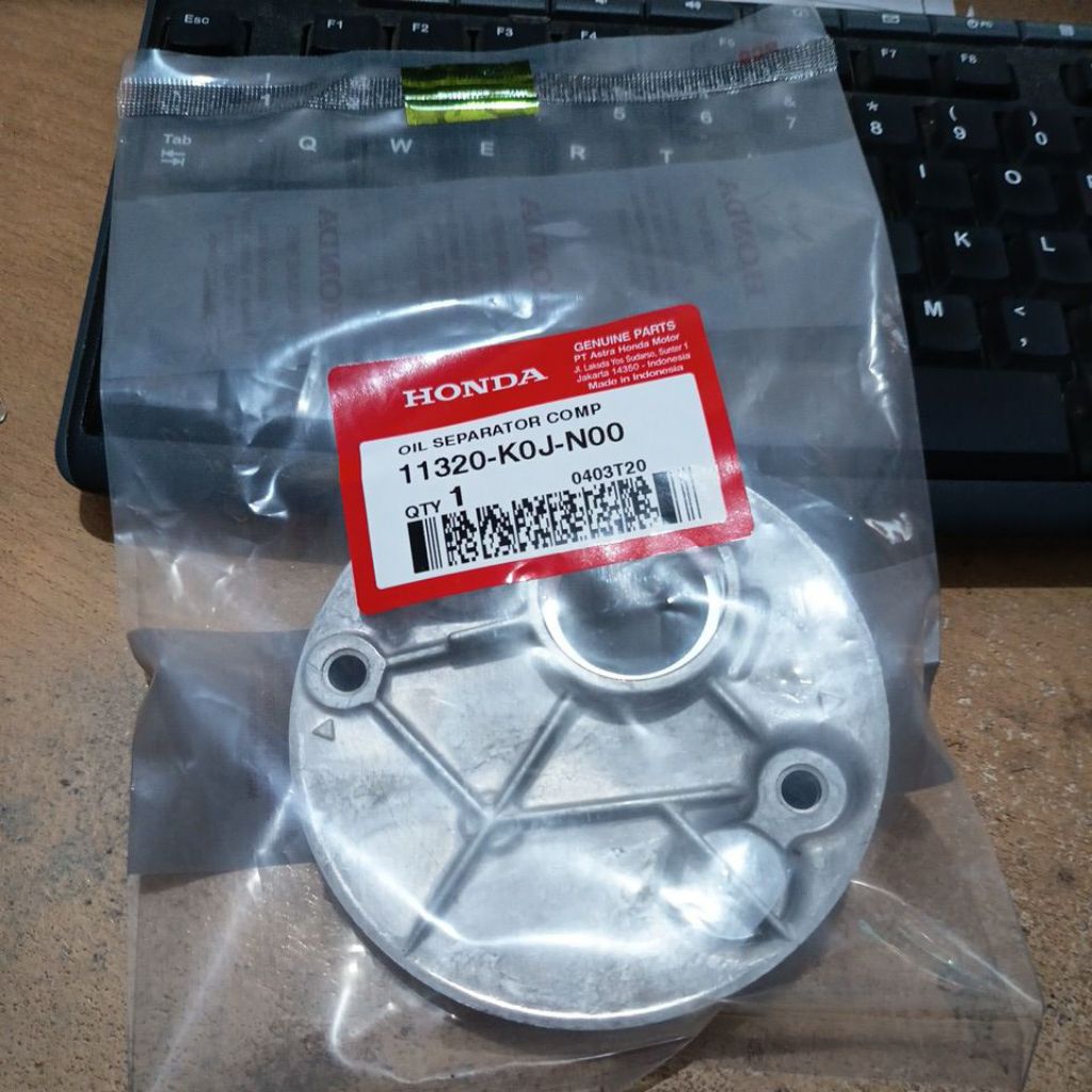 TUTUP POMPA OLI SEPARATOR HONDA GENIO BEAT STREER SCOPPY K2F (11320-K0J-N00)
