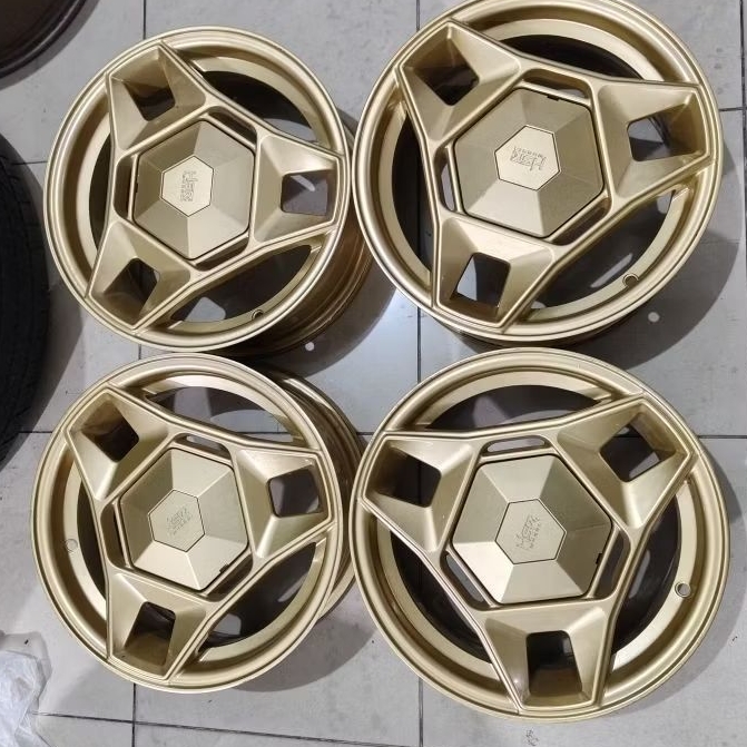 VELG MOBIL BEKAS HSR TELU RING 14X6 H4X100/114,3 ET36 WARNA GOLD