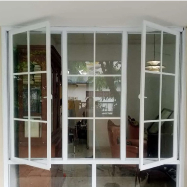 Jendela swing aluminium alexindo 3in dan kaca polos 5mm motif ornamen