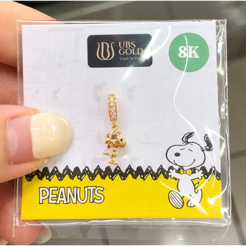 MA15- CHARM SNOOPY UBS 0.6GR KADAR 375 PEANUTS