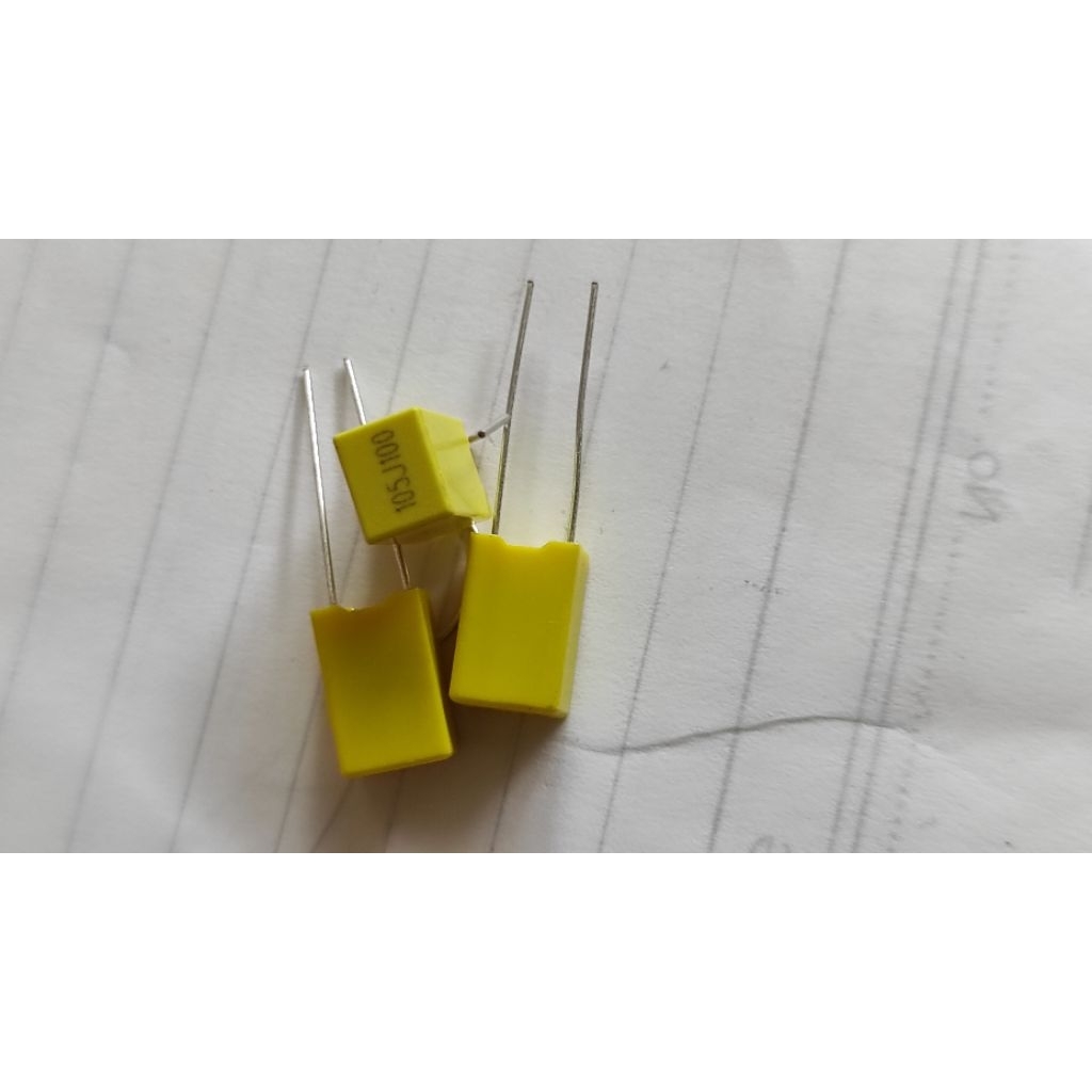 kapasitor MKM 105 Warna kuning capasitor mkm 105