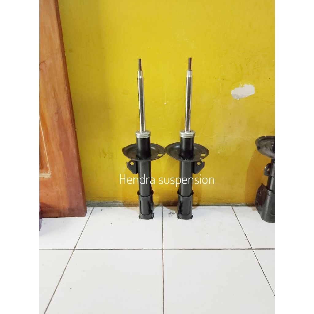 shockbreaker Yaris bakpao depan original