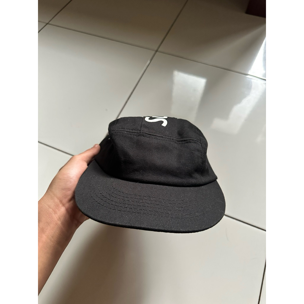 topi supreme s logo