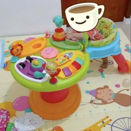 Preloved around we go bright start baby walker