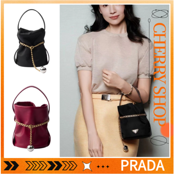Prada Petit Sac Noir Re-Nylon Mini Bucket Bag with Nappa Leather/Tas ember mini kulit