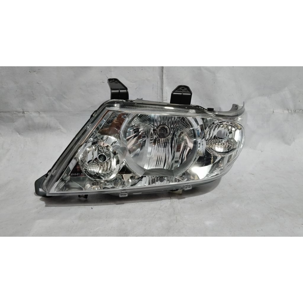 Lampu Depan Isuzu panther grand touring