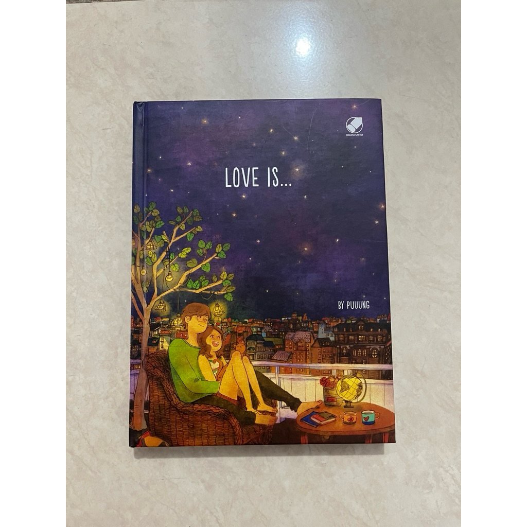 [preloved] BUKU HARD COVER LOVE IS BY PUUUNG