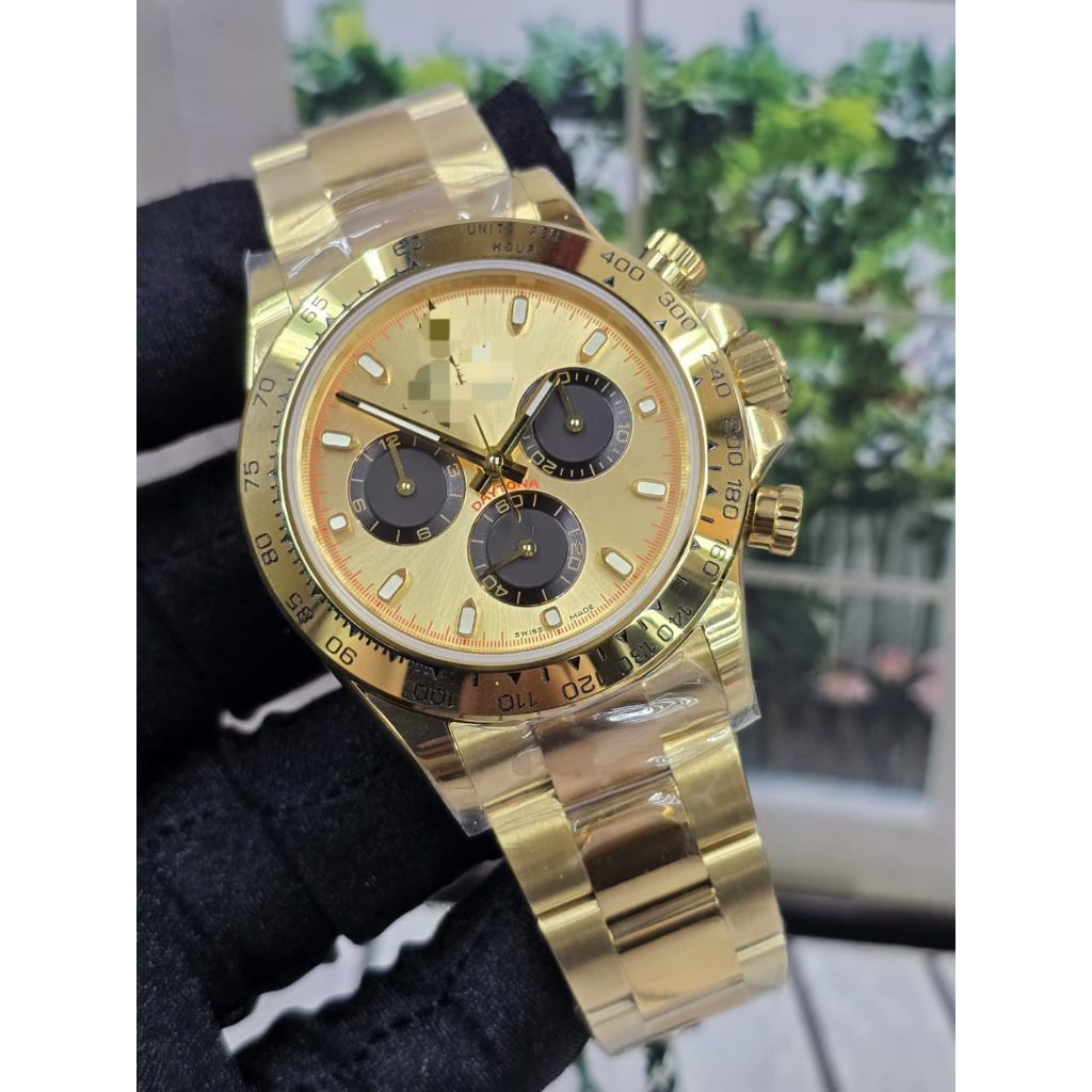 Jam FULL SWISS TIER 5 Cosmograph Daytona 18k yellow gold, champagne/gold "Paul Newman" dial on Oyste