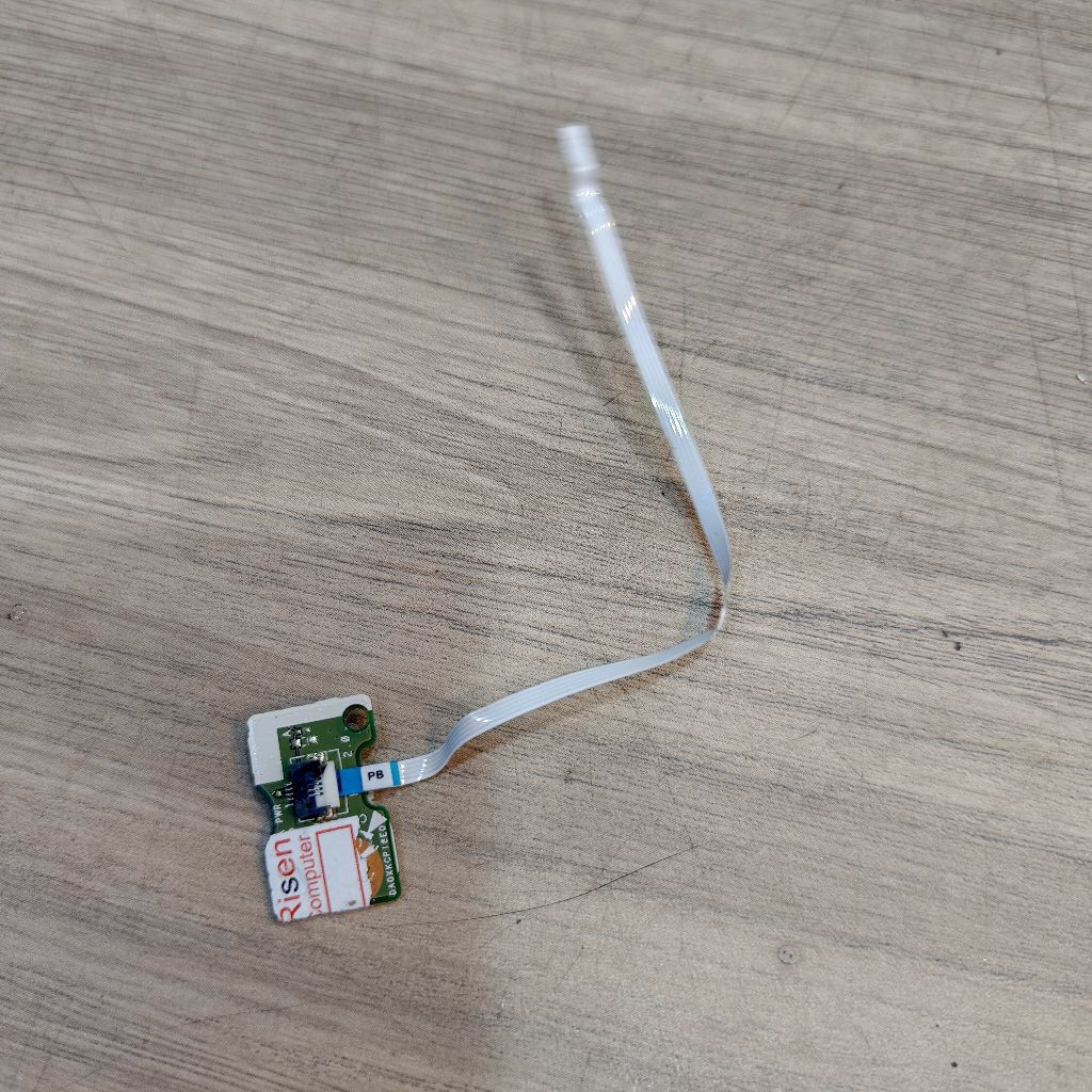 Tombol klik On/Off Asus E203NAH kondisi second masih bagus