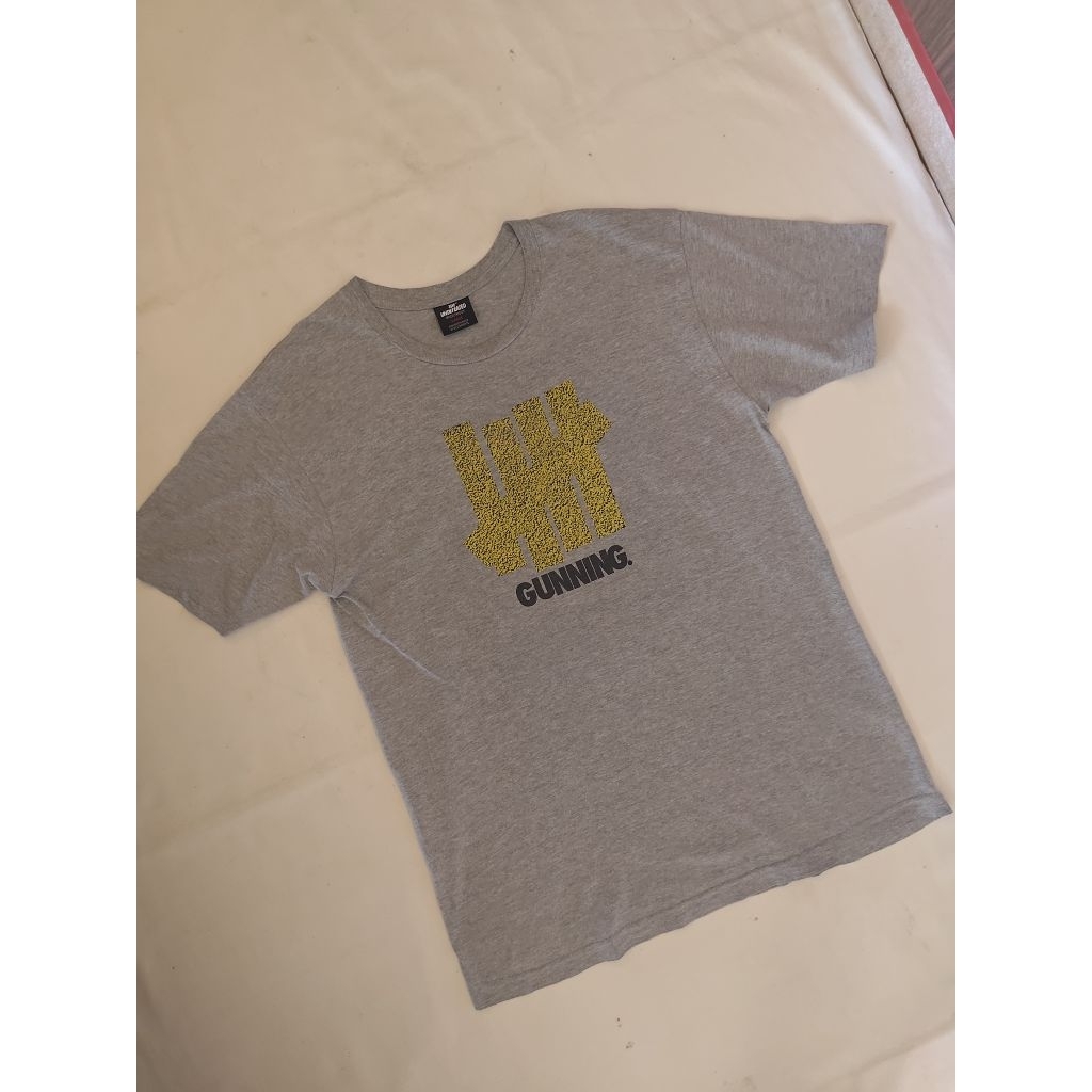 Baju Kaos Undefeated Abu Second