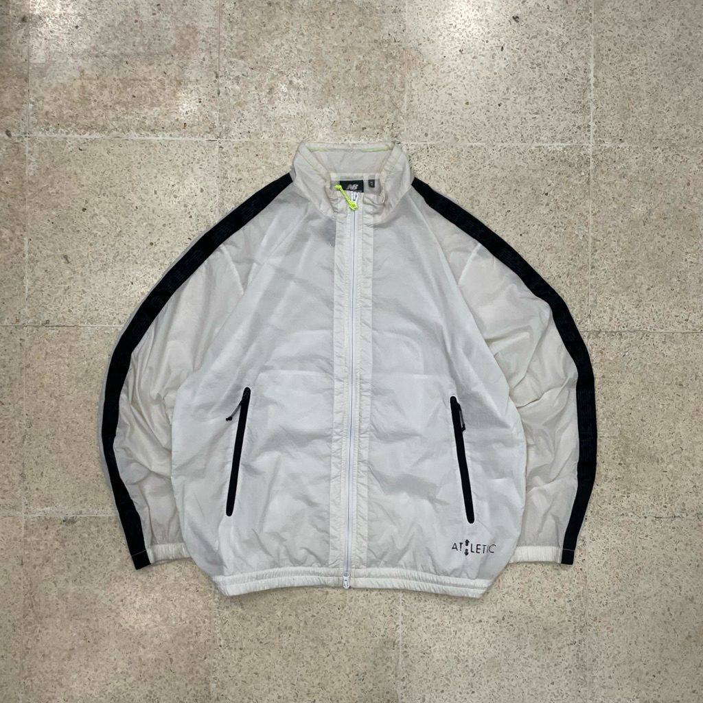 NEW BALANCE RUNNING POCKETABLE JACKET