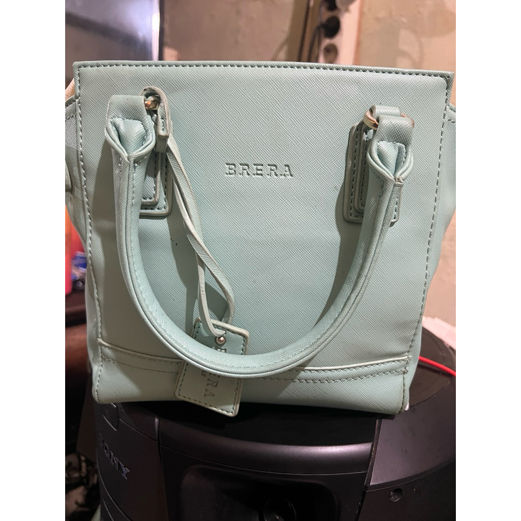 Preloved tas sling brera