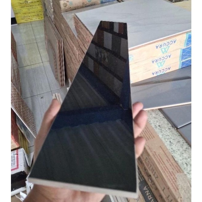List PLINT KERAMIK 10x60 HITAM GLOSSY