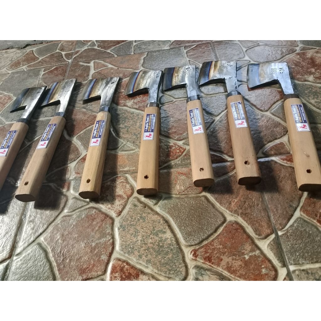 Kapak pengupas kelapa gagang kayu