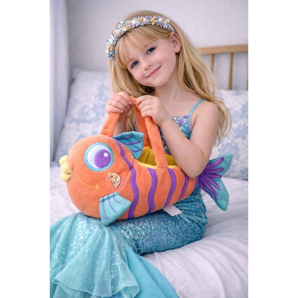 boneka ikan tempat sesuatu lucu