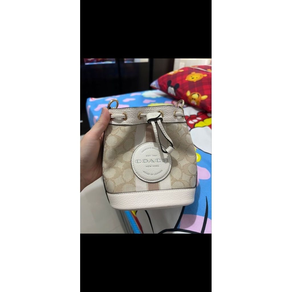preloved tas coach dempsey jacquard mini