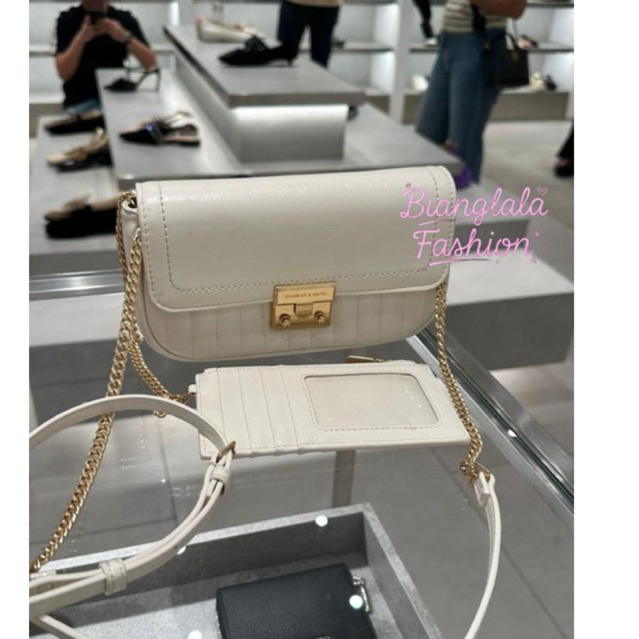 charles and keith slingbag with card holder