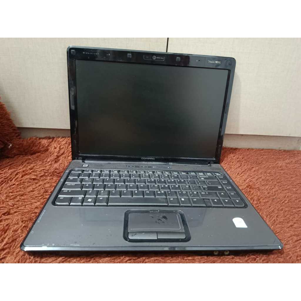 Laptop Compaq presario V3000  Windows 7 Ultimate 64-bit  Processor Intel Pentium dual T2390 1.9GHz R