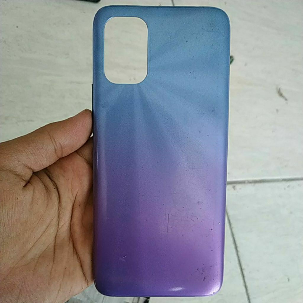 backdoor bekas Advan G9 pro,ada patah bagian tombol power fisik sesuai gambar tombol beda warna