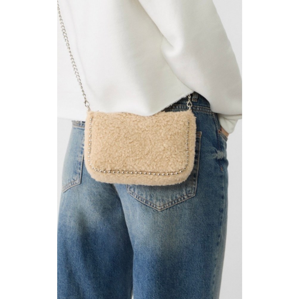 STRADIVARIUS beige faux-fur crossbody bag with a metal chain strap