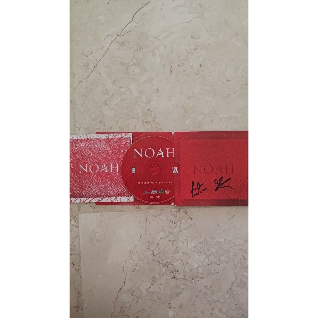 CD Official Noah Album Keterkaitan Keterikatan
Beserta Tanda Tangan David & Lanlan
