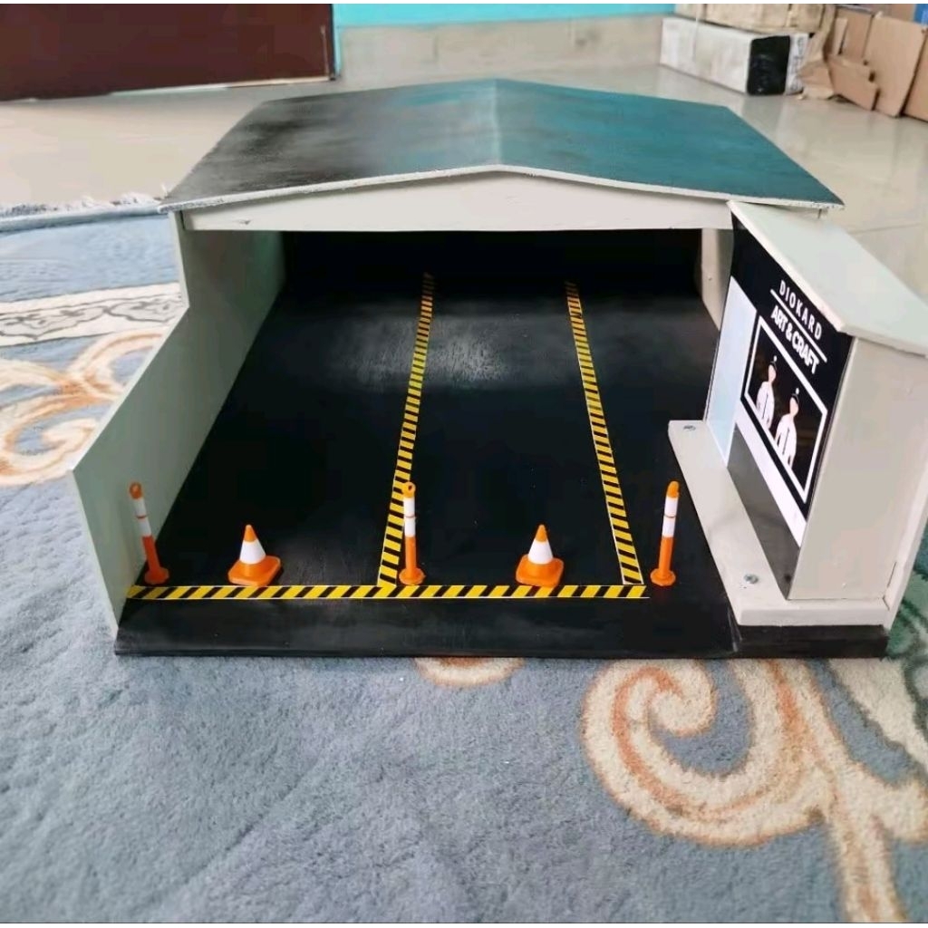 GARASI MINIATUR BUS BASURI