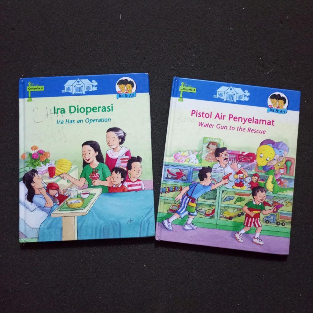 Buku Anak Bilingual – Ira & Ari: Ira Dioperasi & Pistol Air Penyelamat / Seri Cempaka 4 / Cerita Ber