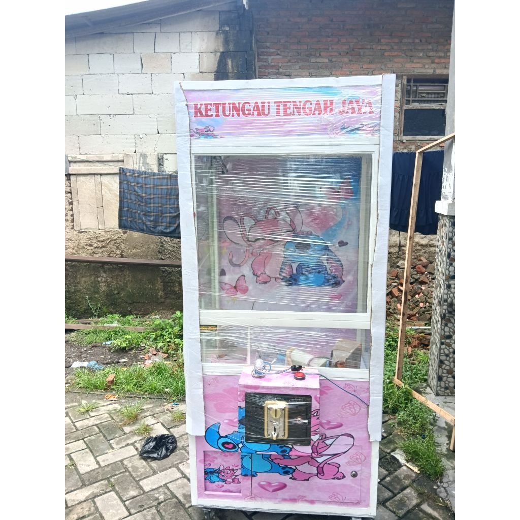 mesin capit boneka second berkualitas.