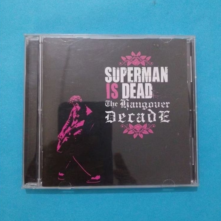 CD MUSIK " SUPERMAN IS DEAD " THE HANGOVER DECADE