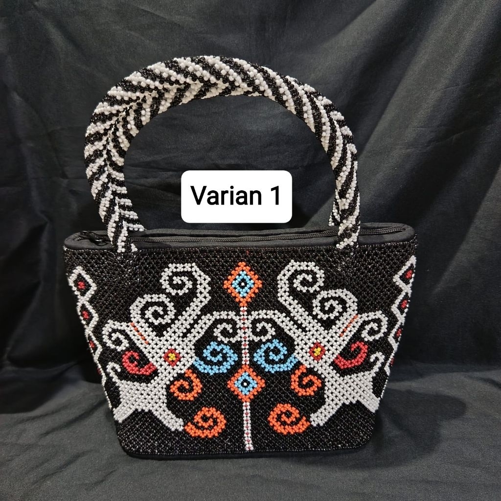 Tas manik motif dayak kalimantan