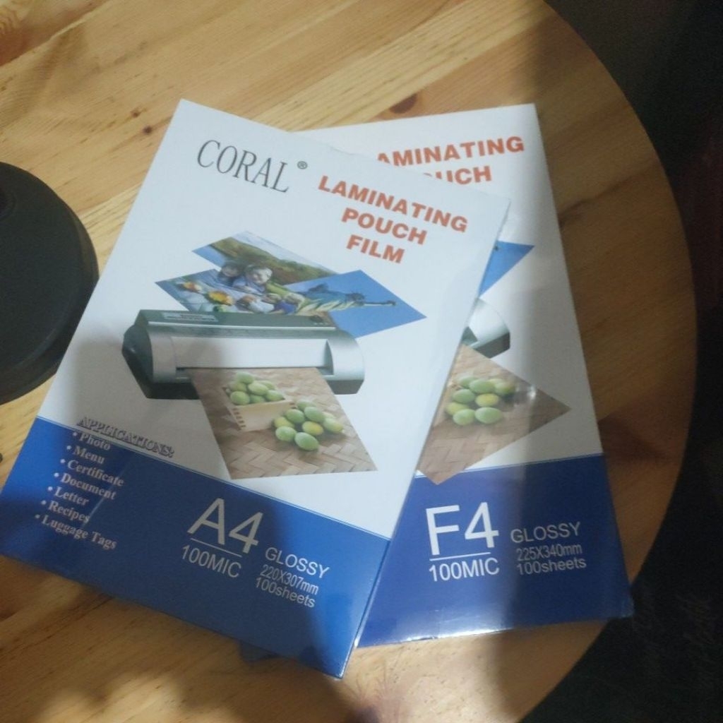 plastik laminating film F4 dan A4 ,laminating pouch film merk coral F4 & A4 isi 100 lembar 100 mic,b