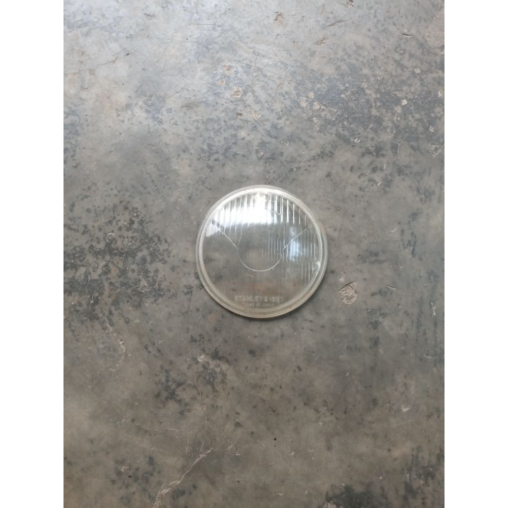Kaca Lampu depan CB 100 original Stanley