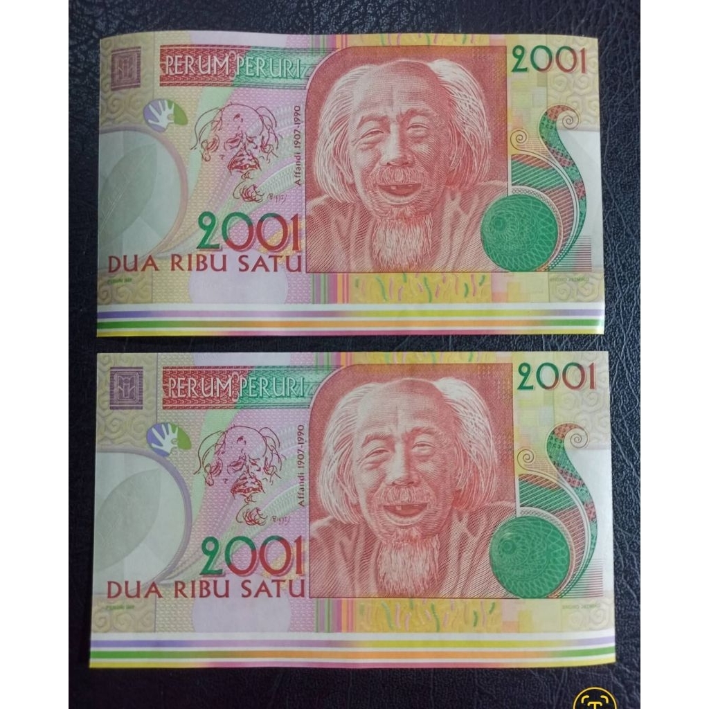 selembar test note adu ayam bali tahun 2001. Miscut pelangi margin bawah. Rare
