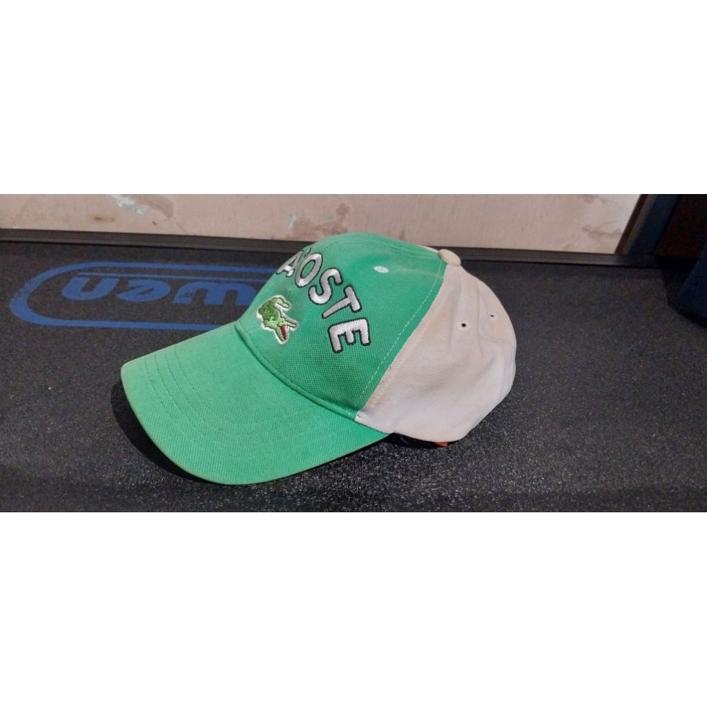 Topi Lacoste Sport