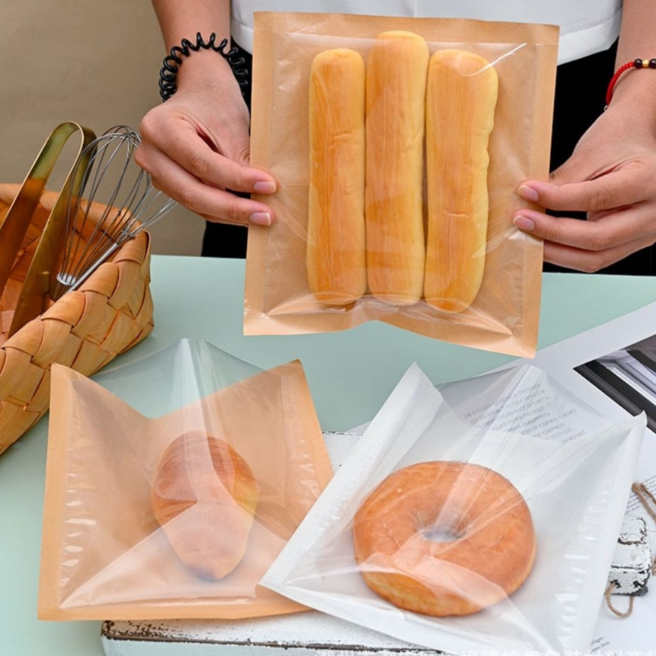kantong roti isi 100 pcs / plastik roti / kertas kue