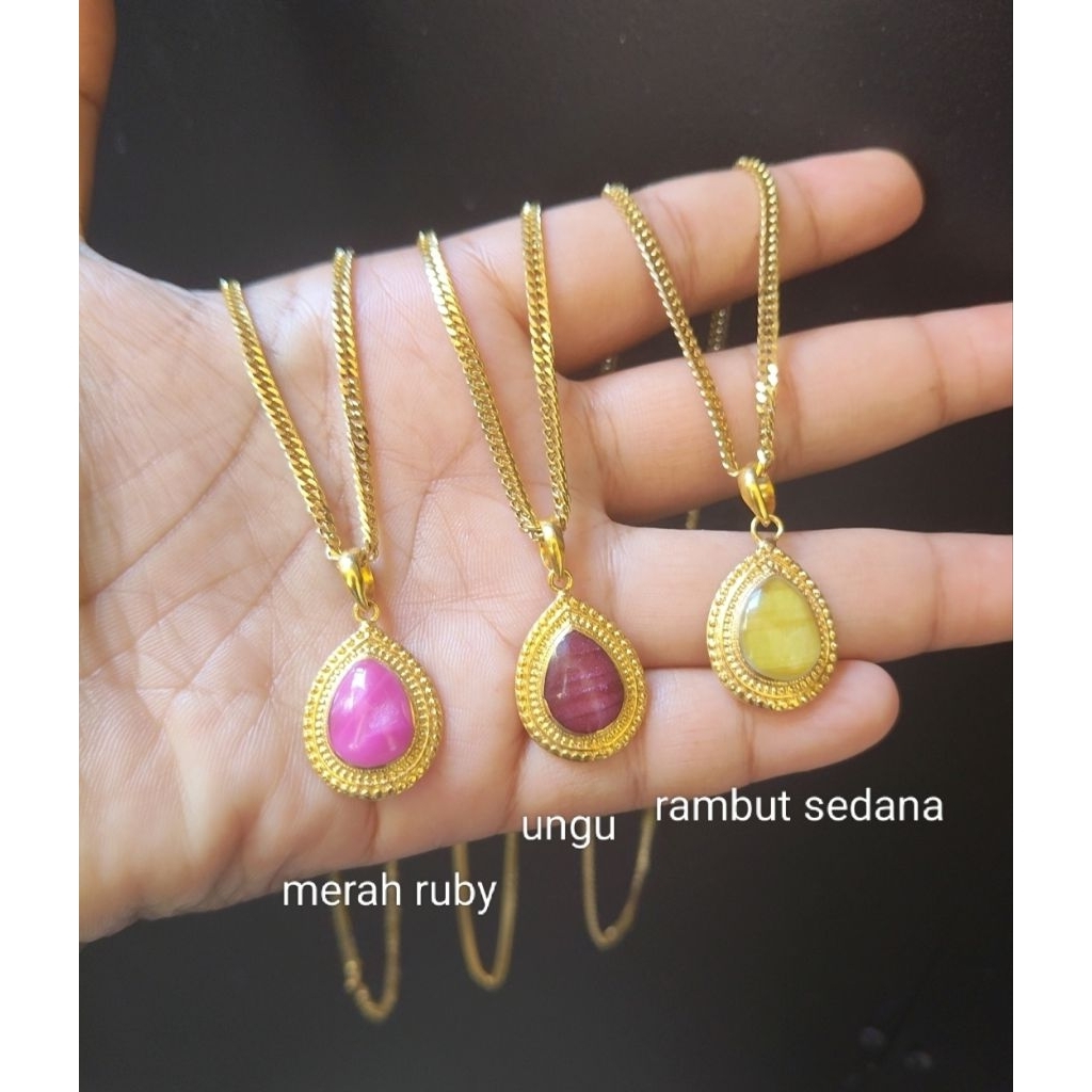 kalung oval titanium liontin Kuningan