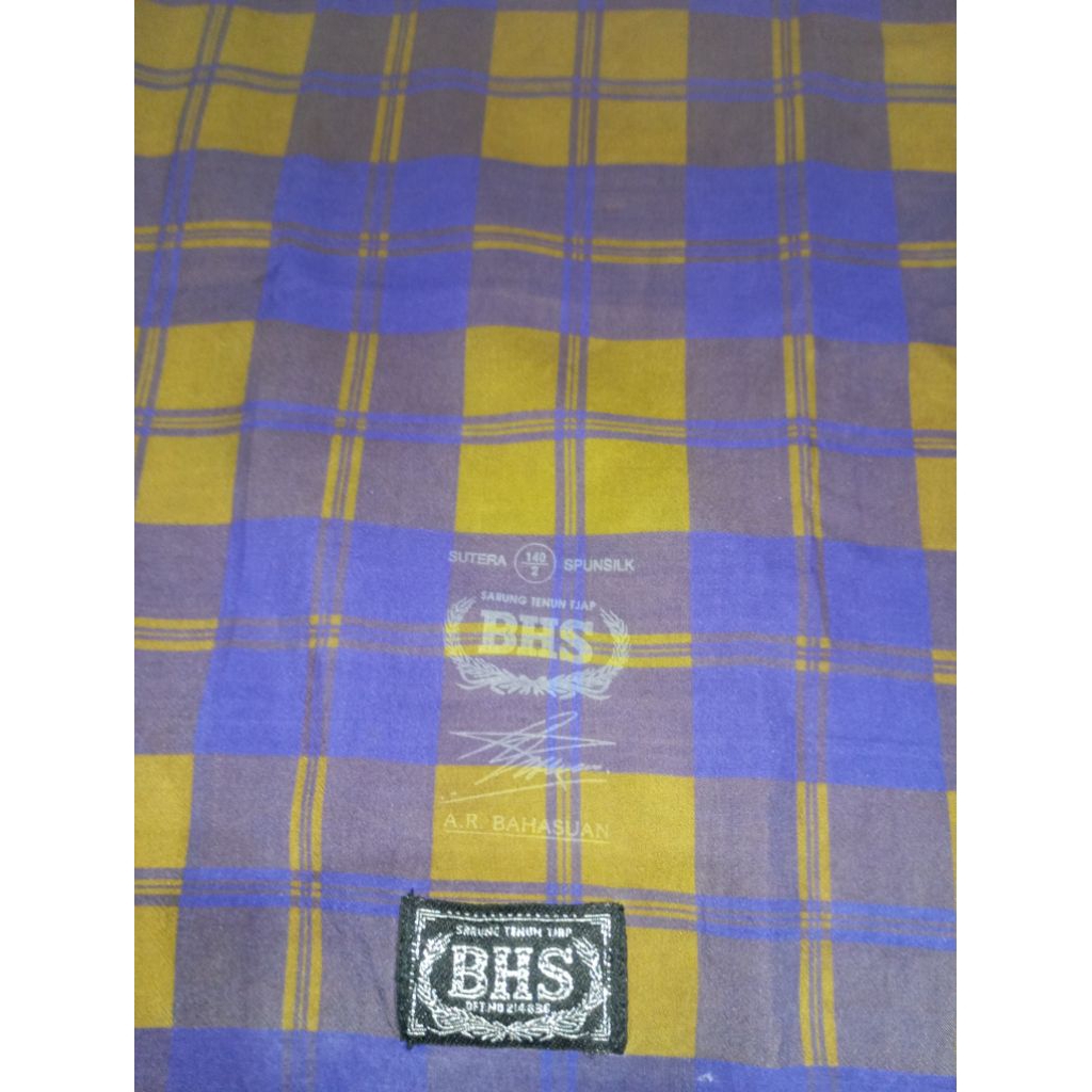 Sarung BHS kdt coklat full sutra spunslik second minus