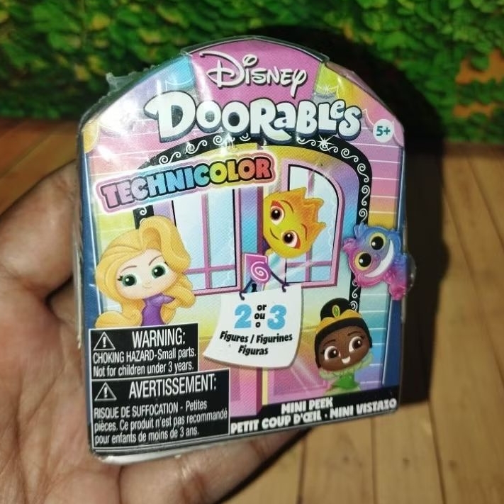 Mainan Disney  Doorables Technicolor New Segel