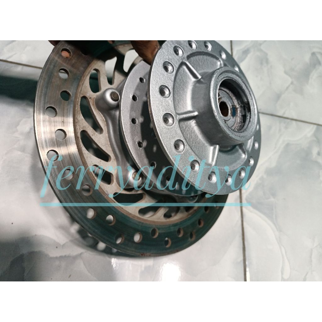 tromol depan original tiger 2000 set piringan