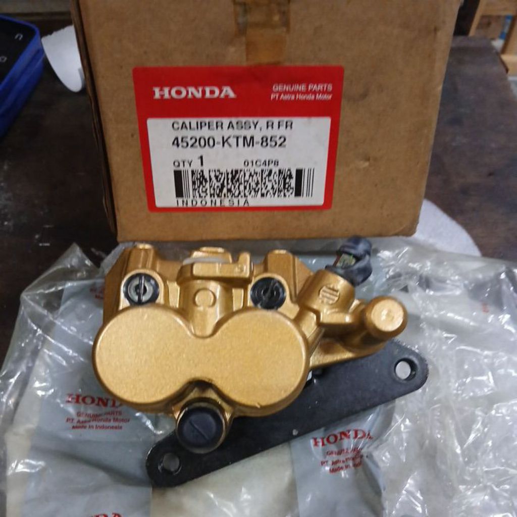 45200 KTM 852 CALIPER KALIPER REM DEPAN SUPRA X125 ORIGINAL AHM