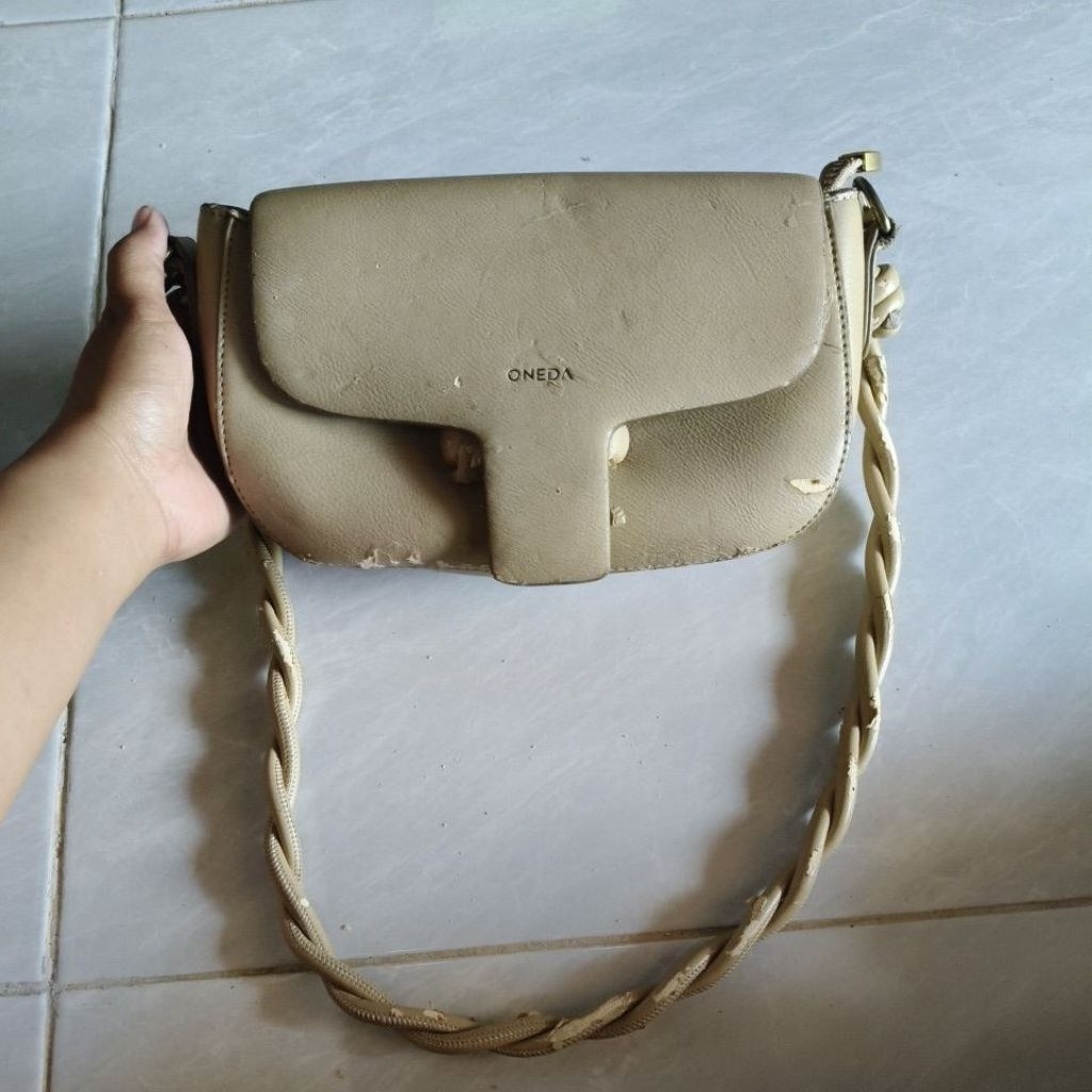 tas oneda