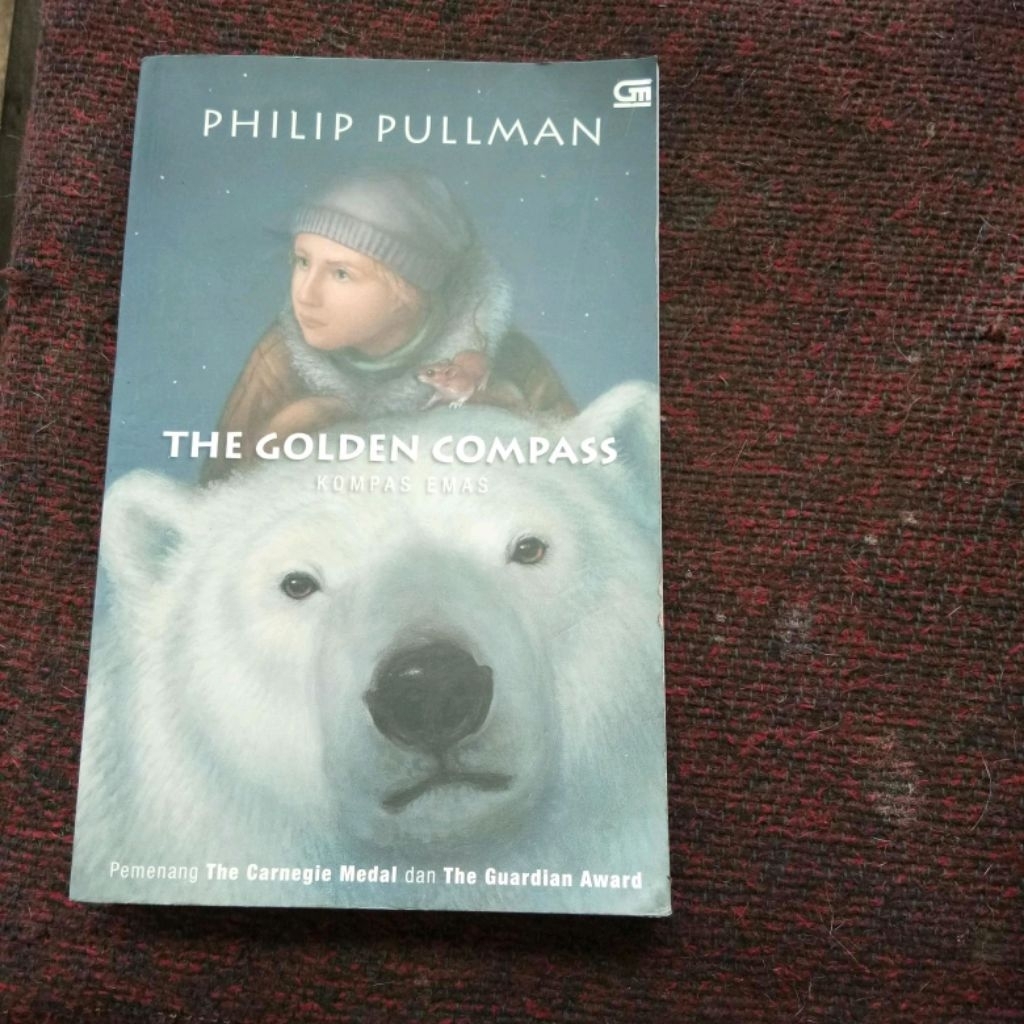 phillip pullman the golden compass buku 1