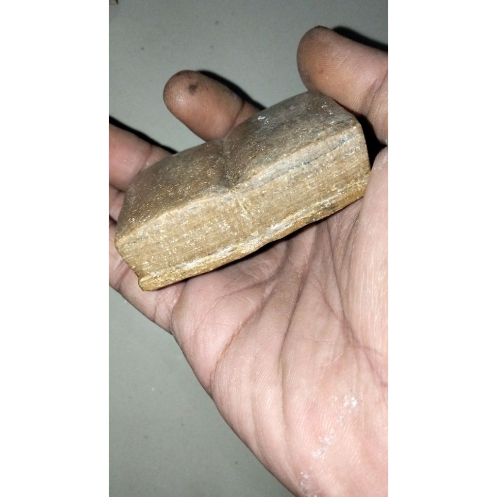 batu buku membuka