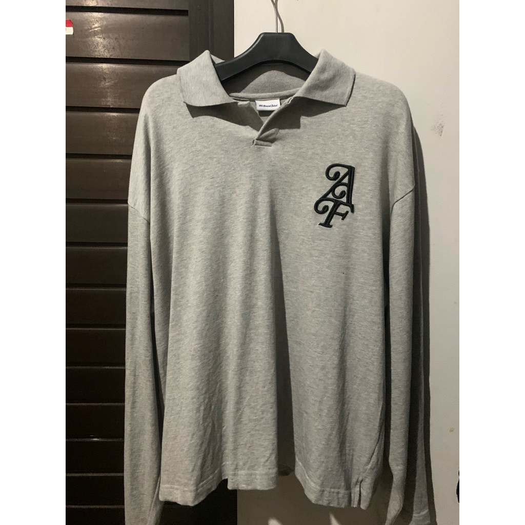 all around faded polo