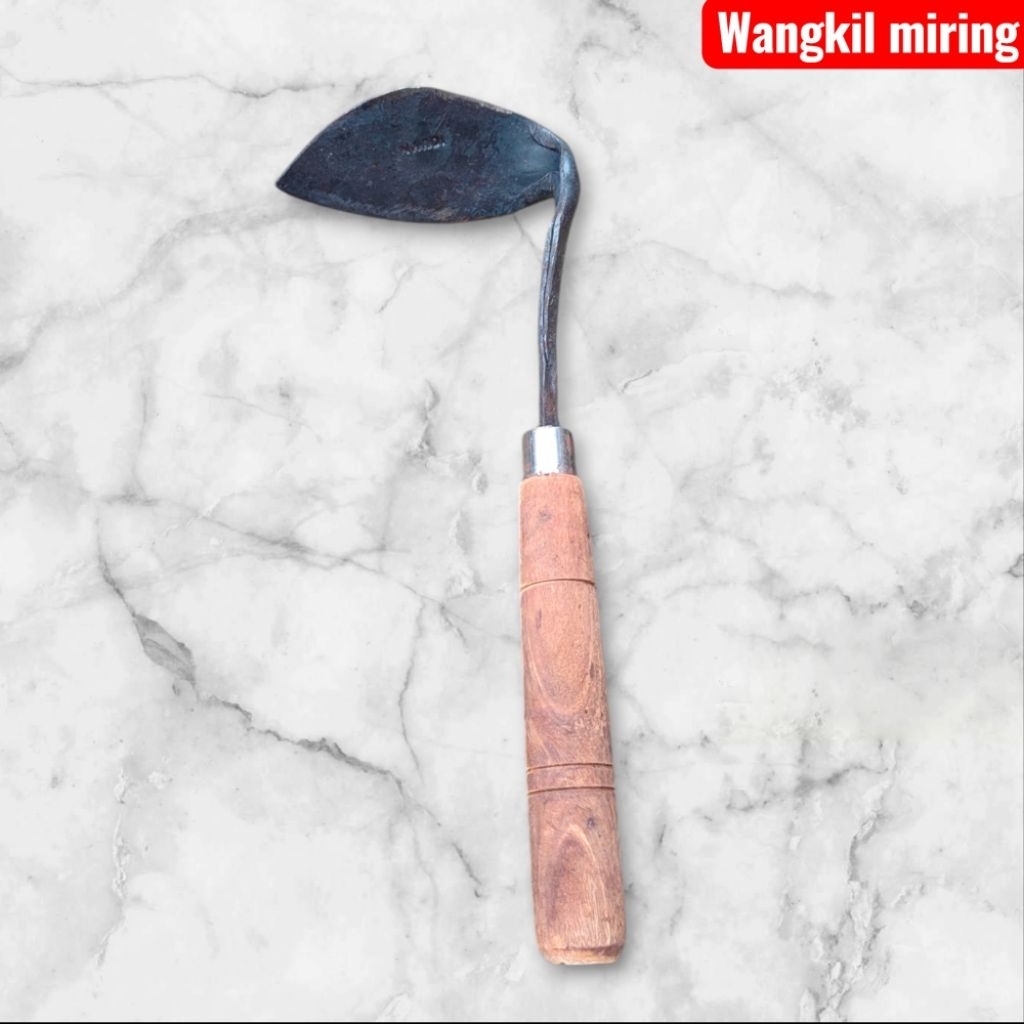 Wangkil miring pembersih rumput berbahan baja