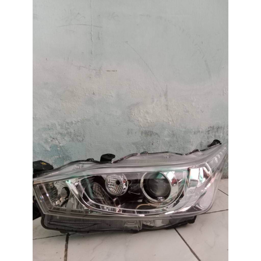 headlamp yaris lele 2014-2015