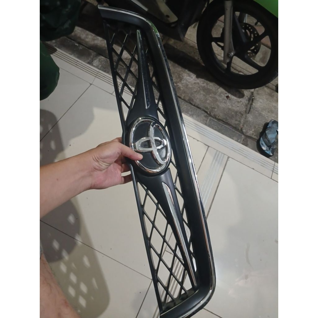 grill terios rush lama original