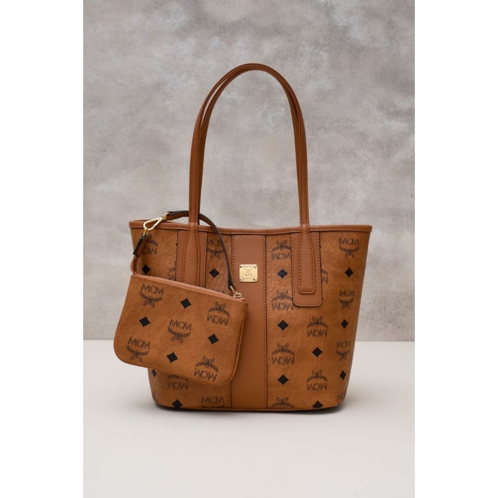 MCM Mini liz reversible shopper vise*tos
Cognac
