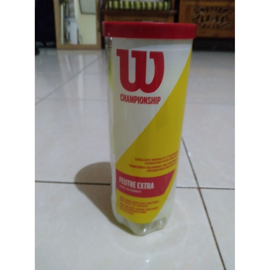 bola tenis lapangan merk Wilson