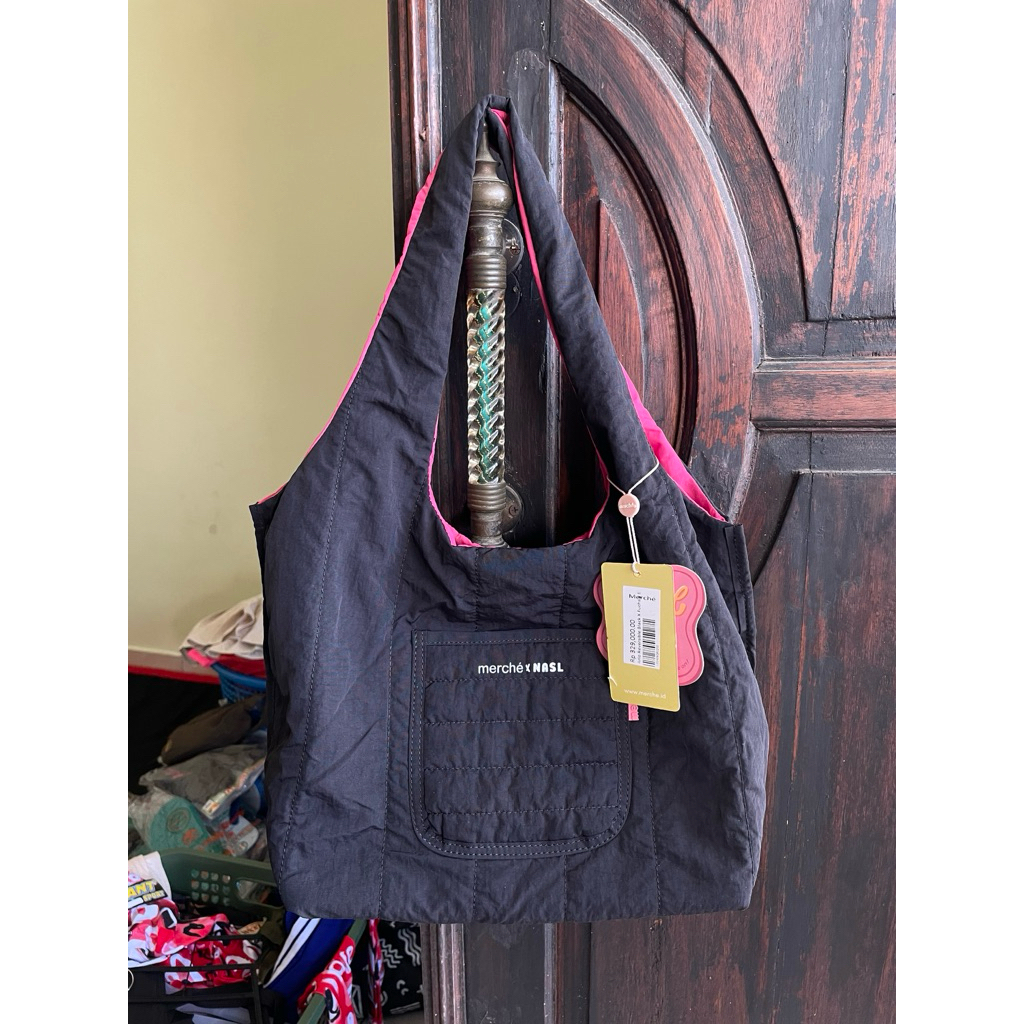 Tas merche X Nasl New